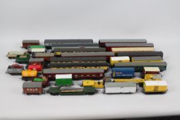 Hornby - Trix - Airfix - Lima - A collection of 33 x items of rolling stock including 12 x coaches,