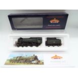 Bachmann - an OO gauge model standard 4MT 4-6-0 locomotive and tender with double chimney,