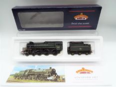 Bachmann - an OO gauge model standard 4MT 4-6-0 locomotive and tender with double chimney,