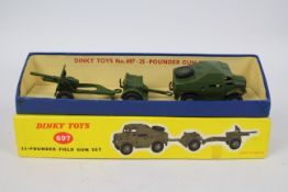 Dinky - Military - A boxed Dinky 25-Pounder Field Gun Set with Field Tractor, Trailer and field Gun.