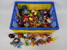 Toy Figures - McDonalds Toys - a large collection of plastic characters featuring Aladdin,