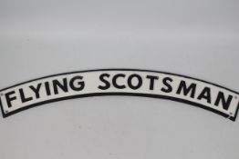 A large cast iron sign marked Flying Scotsman, approximately 89 cm (l).