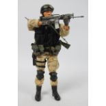 Dragon Models - An unboxed 1:6 scale Dragon Models Modern Elite Series action figure depicting