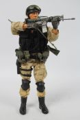 Dragon Models - An unboxed 1:6 scale Dragon Models Modern Elite Series action figure depicting