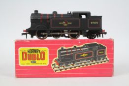 Hornby Dublo - A boxed OO gauge BR 0-6-2 Tank Locomotive operating number 69550 in black. # 2217.