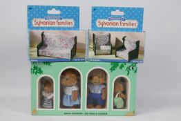 Forest Families & Sylvanian families - An unsealed box set of vinyl flocked figures from the Dog