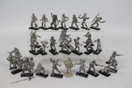 Unmarked Maker - 29 loose and unpainted 54mm white metal 'Western' themed figures,