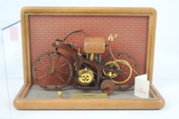 Franklin Mint - A Franklin Mint 1/8 scale 1885 Daimler Single Track Motorcycle.