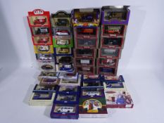 Lledo - A collection of 40 x boxed vehicles including ten Collectors Guild models in perspex