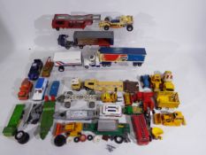 Dinky - Matchbox - Corgi - Tomte-Laerdal - A group of 20 plus unboxed vehicles including Eagle