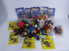 Toy Figures - McDonalds Toys - a large collection of plastic characters featuring Snow White,