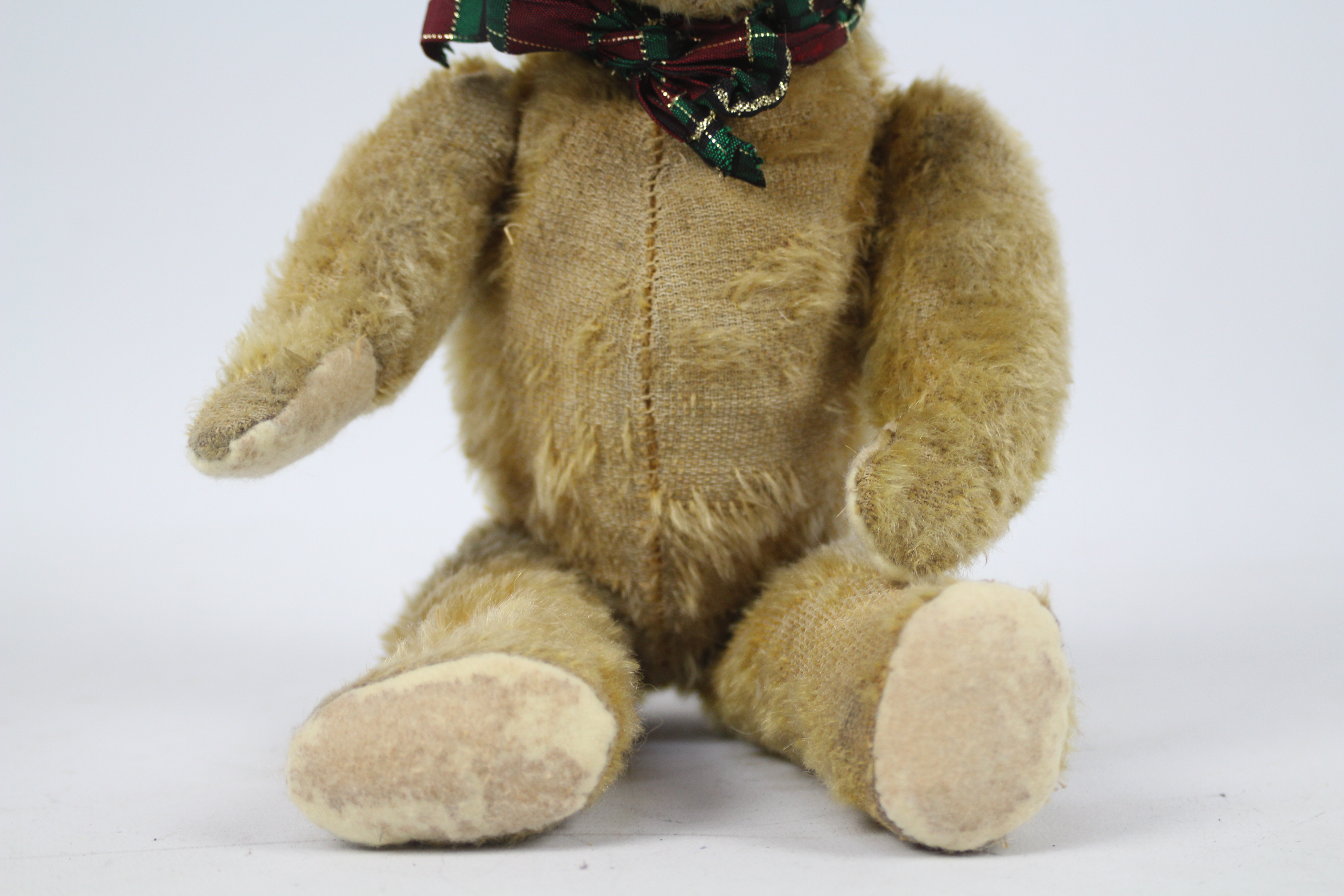 A sawdust filled mohair teddy bear - measuring approx 33 cms in length, having jointed limbs, - Image 3 of 5