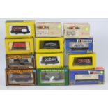 Trix - Mainline - Rivarossi - 12 x boxed OO gauge wagons including a 7 plank wagon in Isaac