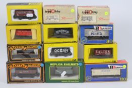 Trix - Mainline - Rivarossi - 12 x boxed OO gauge wagons including a 7 plank wagon in Isaac