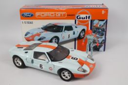 Motor Max - A boxed 1:12 scale Ford GT40 Concept in Gulf livery.