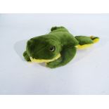 Steiff - A Steiff frog in green and yellow, with a yellow Steiff tag and gold button.