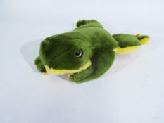 Steiff - A Steiff frog in green and yellow, with a yellow Steiff tag and gold button.