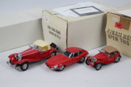 Franklin Mint - 3 x boxed vehicles in 1:24 scale, MG TC, Jaguar E Type Coupe and Mercedes Benz SSK.