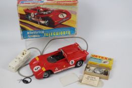 Rare Vintage Remote Control Alfa Romeo - AMB Italy. An AMB Italy remote control Alfa Romo 33P #774.