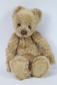 Charlie Bear - An unnamed 27cm tall Charlie Bear with ringing bell attached at neck,