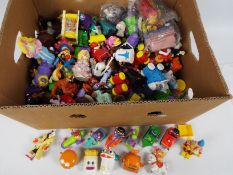 Toy Figures - McDonalds Toys - a large collection of plastic characters featuring Aladdin,