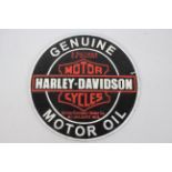 A cast iron wall plaque marked Harley - Davidson Motor Cycles, approximately 24 cm (d).