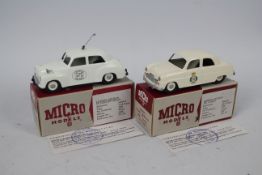 Micro Models - 2 x boxed limited edition Police cars in 1:43 scale,