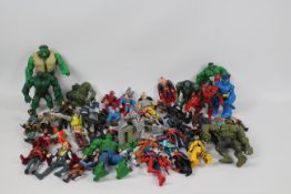 Marvel - DC - Hasbro - Toybiz. In excess of 20 loose figures to include: A 2008 Toybiz Iron Man.