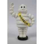 A cast iron Bibendum (Michelin Man) money bank, approximately 23 cm (h).