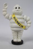 A cast iron Bibendum (Michelin Man) money bank, approximately 23 cm (h).