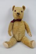 Large wood wool filled teddy bear - Jointed, worn golden mohair bear with squeaker,