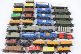 Hornby - Wrenn - Rivarossi - Peco - Trix - A collection of 34 x unboxed OO gauge wagons including 7