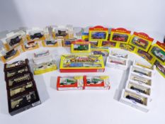 Lledo - A collection of 34 x boxed vehicles including seven Euro 96 models, six Rupert models,