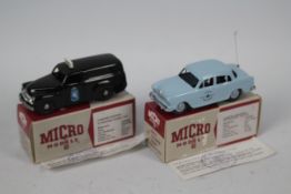 Micro Models - 2 x boxed limited edition Holden Police vehicles in 1:43 scale,