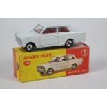 Dinky - A boxed Vauxhall Viva HA saloon in the less common white finish # 136.