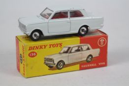 Dinky - A boxed Vauxhall Viva HA saloon in the less common white finish # 136.