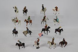 Timpo - Britains - Others - A collection of sixteen mounted Western themed metal figures by various