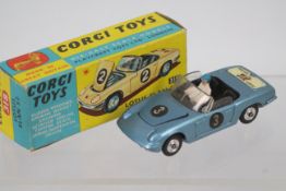 Corgi - A boxed Lotus Elan S2 in blue with driver figure # 318.