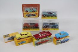 Atlas Dinky - 8 x boxed vehicles including Aston Martin DB5 in two different colours # 110,