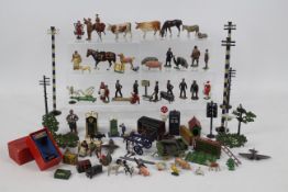 Dinky Toys - Johillco - Hornby - Britains - An unboxed group of diecast model accessories,