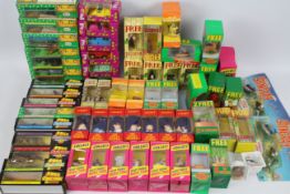 Tetley Tea - A boxed group of 60 promotional Tetley Tea plastic toys / models,