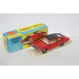 Corgi - A boxed Corgi Rambler Marlin Fastback # 263. The car appears Mint in a Very Good box.