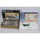Meng - AMT - Modelcraft - Three boxed military aircraft plastic model kits in various scales.