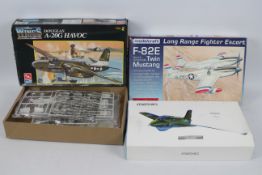 Meng - AMT - Modelcraft - Three boxed military aircraft plastic model kits in various scales.