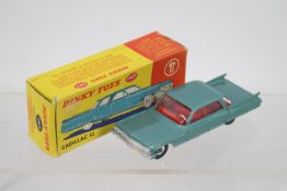 Dinky - A boxed Dinky Cadillac 62 Series Sedan # 147.