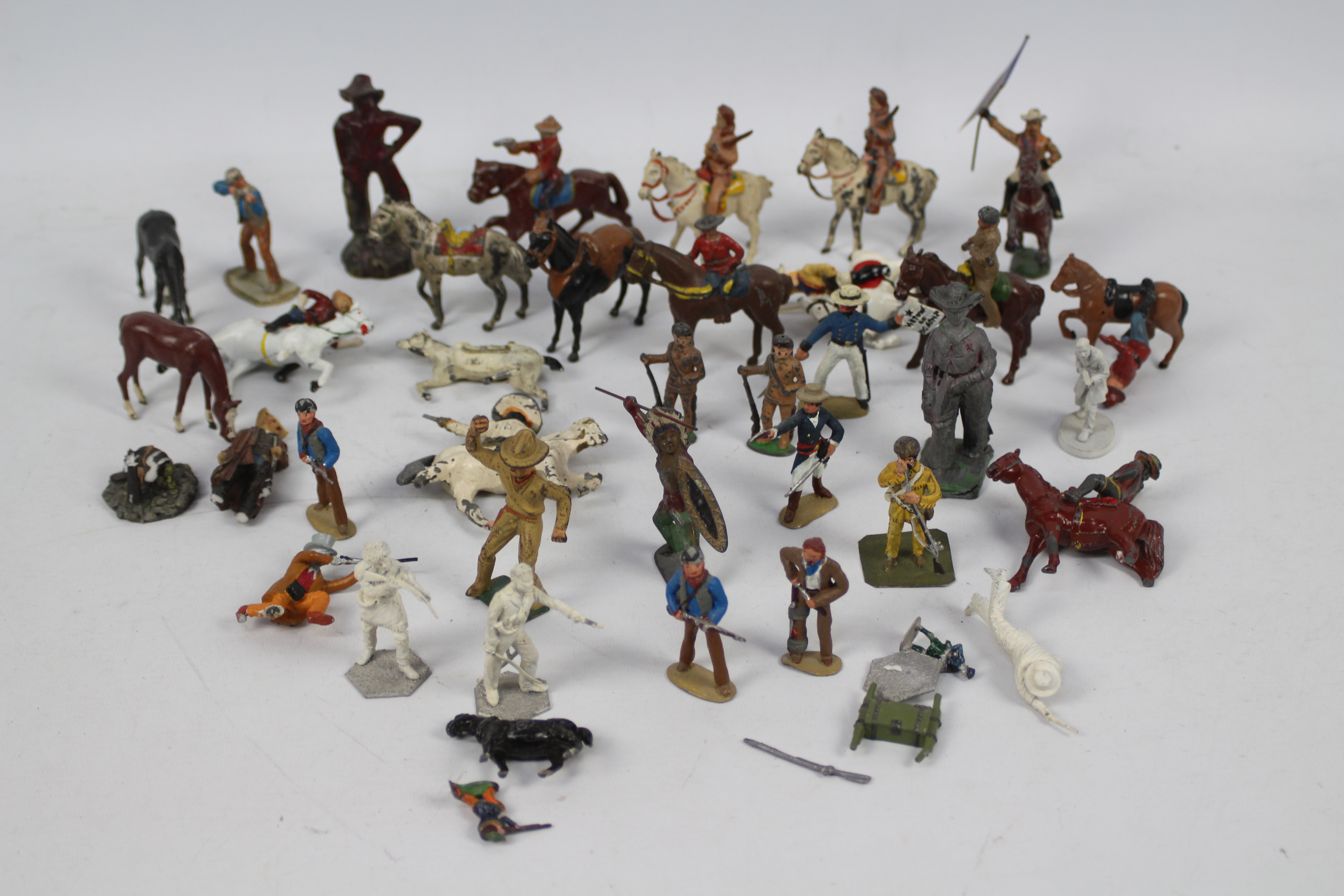 Timpo - Britains - Others - Over 30 Western themed metal figures by various manufacturers.
