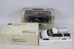 UT Models - 2 x boxed 1:18 scale cars, a BMW Z3 Coupe 2.8 and a Ford Expedition Eddie Baur Edition.