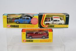 Corgi - 3 x boxed models, Hillman Hunter Rally Car # 302, Morris Marina Coupe # 306,