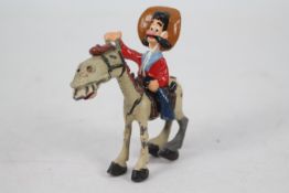 Sacul - An unboxed early 1950's 'Hank and Silver King' figure.