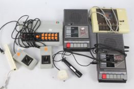 Radotin - An unboxed vintage Radotin video game with three vintage gaming cassette recorders.